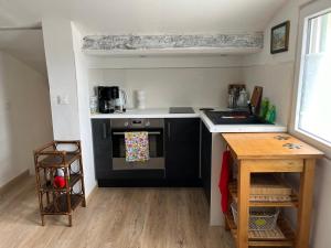 Appartements Au dessus du chateau : photos des chambres