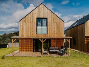 Holiday Home by Lake arnowieckie with Jacuzzi