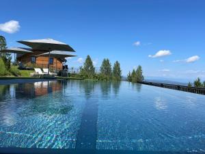 Tomtegl-Bergchalet-No-9-mit-Privatsauna-Infinitypool-Kamin-Fitnessraum-1500m-Seehoehe