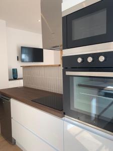 La Belle Odet- - choix d-appartements- Centre ville-quais : photos des chambres