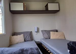 Chalets MHSweetHome Piscine wifi prive TV 3 chambres 6 pers 32m2 : photos des chambres