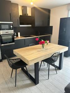 Appartements F2 56m2 - Arena Gd Paris - Parc des expositions Villepinte - Aeroport Paris CDG : photos des chambres