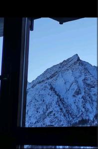 Monolocale nel cuore delle Alpi