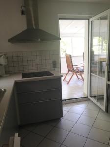 Ferienwohnung am Bodensee mit Wintergarten, Garten und Grillhaus bis 6 Person