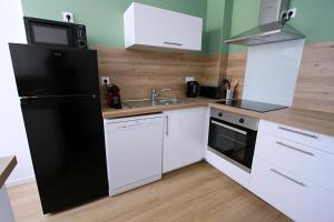 Appartements Appartement Terrasse et Jardin : photos des chambres