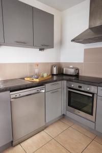 Appartements Appartement le Joliot Curie 4-6 pers a Lyon - Eurexpo - LDLC arena - Groupama Stadium - Eurexpo - 15mn Lyon : photos des chambres