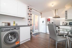 Spacious two bed house with parking and garden