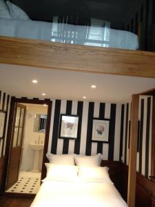 Appartements Apartment Le 1725 : photos des chambres