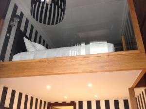 Appartements Apartment Le 1725 : photos des chambres