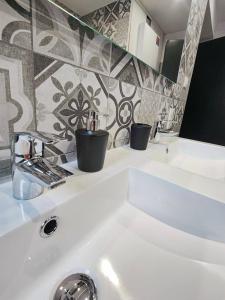 Appartements Appartement Le Baroque en duplex : photos des chambres
