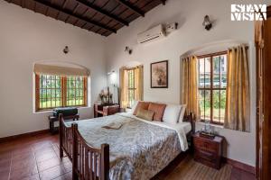 CVM House with Lawn at Thiruvalla by StayVista