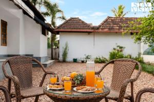 CVM House with Lawn at Thiruvalla by StayVista