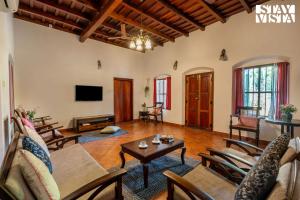 CVM House with Lawn at Thiruvalla by StayVista