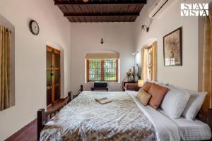 CVM House with Lawn at Thiruvalla by StayVista