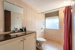 StayVista at Three Shores with Lake View & Alfresco Dining