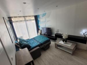 Appartements Studio F1 tout confort centre ville : photos des chambres