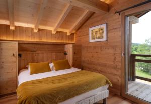 Chalets Le Grand V, chalet de luxe avec piscine interieure : photos des chambres