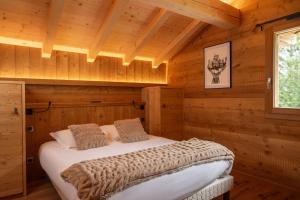 Chalets Le Grand V, chalet de luxe avec piscine interieure : photos des chambres