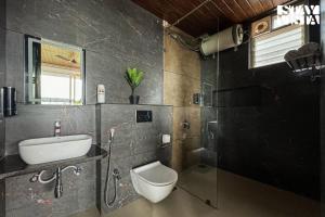 Waterfront Villa with Infinity Pool & BBQ Grill at Pune by StayVista