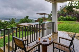Waterfront Villa with Infinity Pool & BBQ Grill at Pune by StayVista