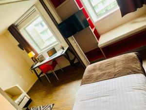 Appart'hotels Standing Hotel Suites by Actisource : photos des chambres