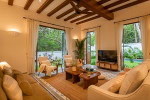 La Branca, Luxurious 4 BHK villas near Peaceful Morjim Beach, with Private Pool, Big Garden, Security, Kitchen, Wifi, Terrace by The Blue Kite