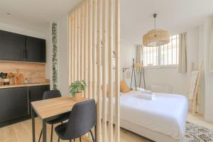 Appartements Le cosy en hypercentre : photos des chambres