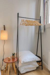 Appartements Le cosy en hypercentre : photos des chambres