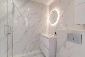 Appartements Le cosy en hypercentre : photos des chambres