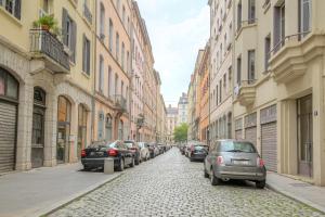 Appartements Le cosy en hypercentre : photos des chambres