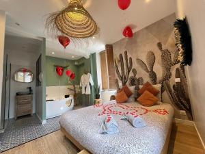 Appartements Le Nid d'Eliyah, suites avec jacuzzi 15min Disneyland Paris : photos des chambres