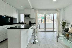 Apartamento en 1ª línea de playa, piscina y parking