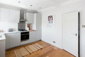 Notting Hill Home on Tree-Lined Street Near Tube Stations