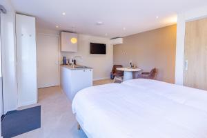 Studio 100 meter van het strand en centrum - eigen parkeerplaats.