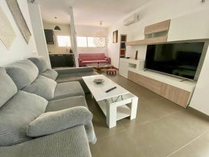 Candela Atico con piscina compartida