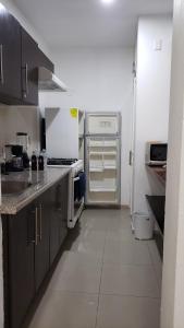 Departamento equipado a unos pasos de la playa, 2 Recamaras Aire acondicionado