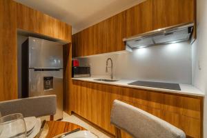 King Suite with Private Balcony, Gym and Rooftop Pool