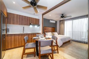 King Suite with Private Balcony, Gym and Rooftop Pool