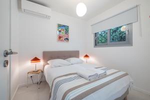 Appartements FEEL HOME - GRASSEUIL : photos des chambres