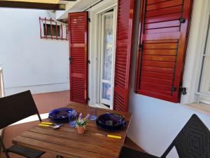 L03 - Grazioso bilocale con giardino e posto auto