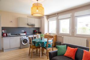 Appartements Le Prunier : photos des chambres