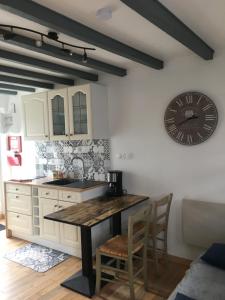 La maison den face