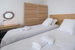 Appartements AR RANNDI - Splendide T3 de standing vue mer : photos des chambres