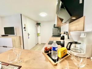 Appartements Le Populaire, cosy et lumineux : photos des chambres