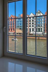 Elegancki & Przestronny Apartament nad Motławą by Noclegi Renters