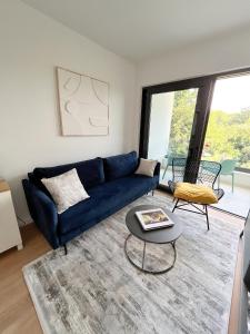 The Modern Apartment in the Nature with a Pool & Gym 