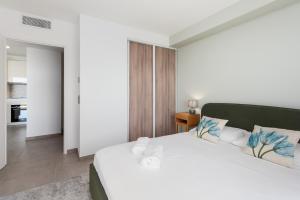 Appartements Luxueux appartement - Parking prive - Piscine - CC : photos des chambres