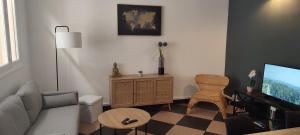 Maisons de vacances Maison charmante avec patio ! : photos des chambres