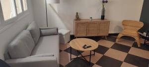 Maisons de vacances Maison charmante avec patio ! : photos des chambres