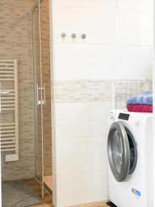 Appartements Le Grand 117 - Climatisation - Wifi - Parking proche : photos des chambres